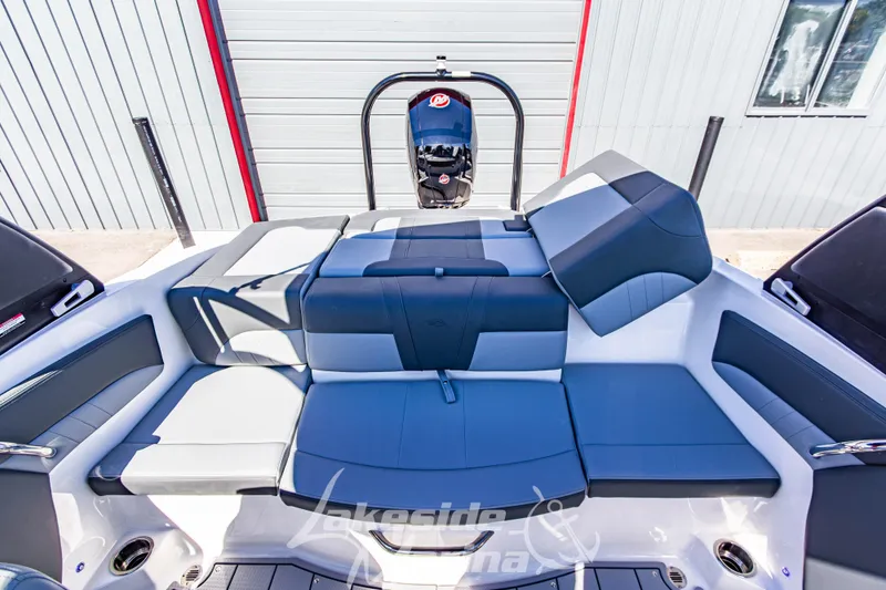 Slide: The Image of 2026 Chaparral 21 SSi OB boat interior with sleek seating and modern design. - 21