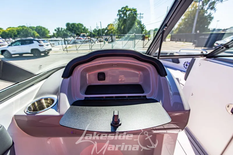 Slide: The Image of Interior view of 2026 Chaparral 21 SSi OB boat at Lakeside Marina. - 26