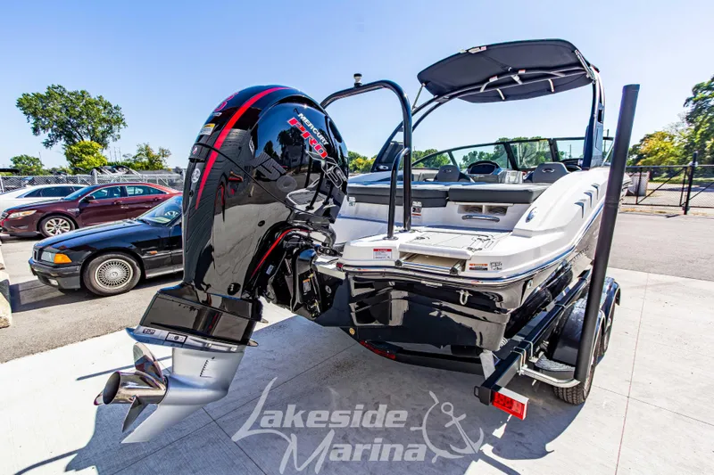 Slide: The Image of 2026 Chaparral 21 SSi OB boat with powerful outboard motor at Lakeside Marina. - 6