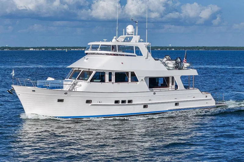 The Image of 2023 Outer Reef Yachts 670 Azure Custom Cockpit Motoryacht cruising on open water. - 0