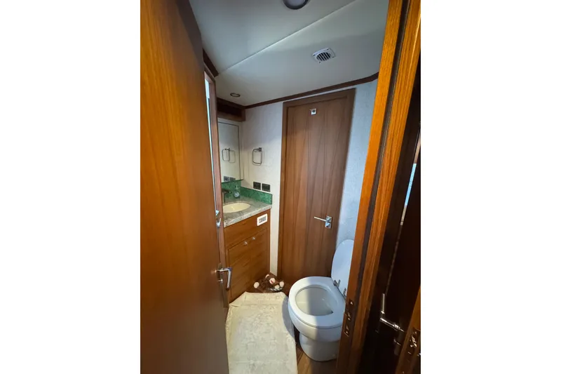 Slide: The Image of Bathroom interior of 2023 Outer Reef Yachts 670 Azure Custom Cockpit Motoryacht. - 21