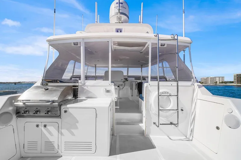 Slide: The Image of 2023 Outer Reef Yachts 670 Azure Custom Cockpit Motoryacht with outdoor grill and ocean view. - 22