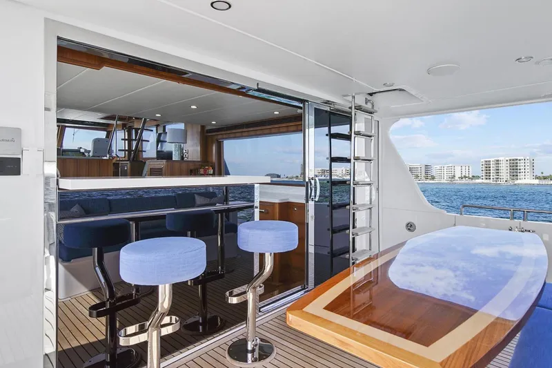 Slide: The Image of 2023 Outer Reef Yachts 670 Azure Custom Cockpit Motoryacht interior with ocean view and modern seating. - 9