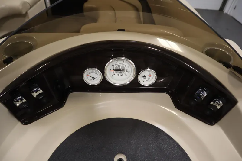 Slide: The Image of 2013 Harris Cruiser 220 dashboard with fuel, RPM, and trim gauges. - 21