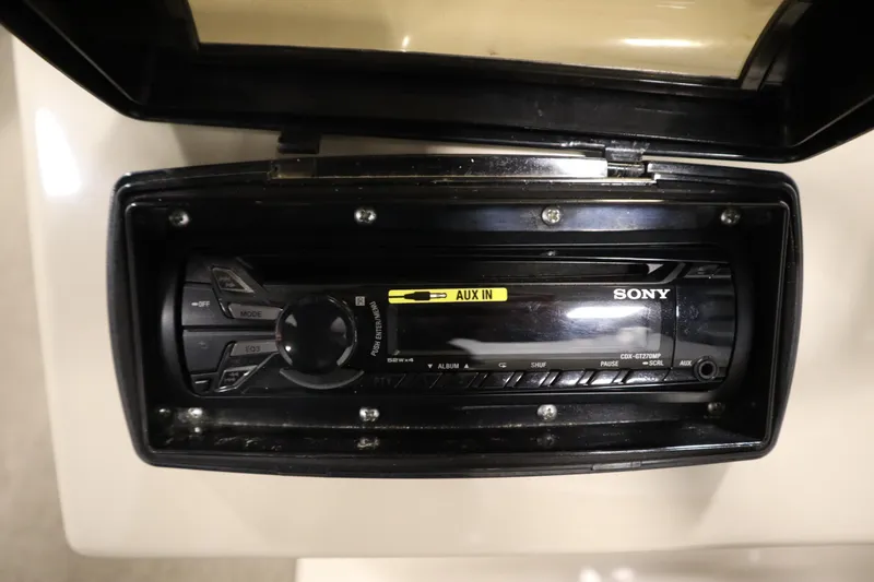 Slide: The Image of Sony stereo system with AUX input in a 2013 Harris Cruiser 220 boat. - 25