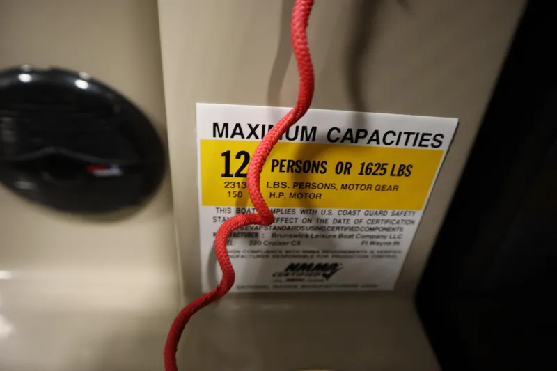 Slide: The Image of 2013 Harris Cruiser 220 capacity label, maximum 12 persons or 1625 lbs. - 26
