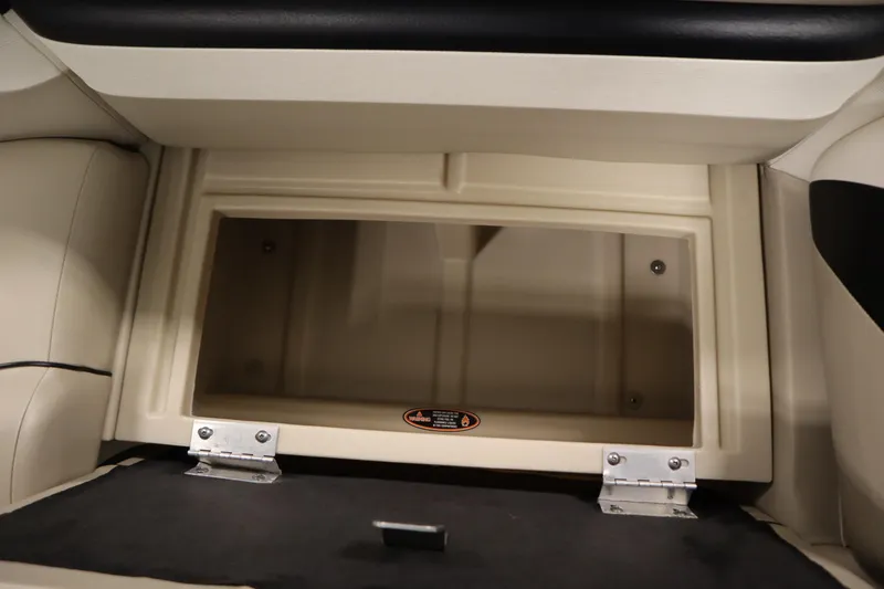 Slide: The Image of Open storage compartment in 2013 Harris Cruiser 220 boat interior. - 30