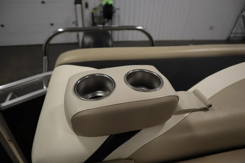 Slide: The Image of Cup holders on beige seating of 2013 Harris Cruiser 220 boat. - 32