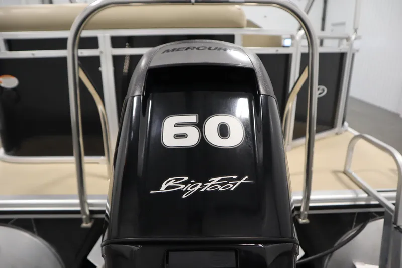 Slide: The Image of 2013 Harris Cruiser 220 with Mercury BigFoot 60 outboard motor. - 38