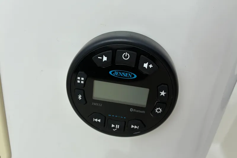 Slide: The Image of Jensen marine audio system on 2023 Bayliner Element 180 XL boat dashboard. - 12