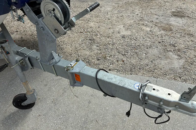 Slide: The Image of Trailer hitch of 2023 Bayliner Element 180 XL on gravel and concrete surface. - 16