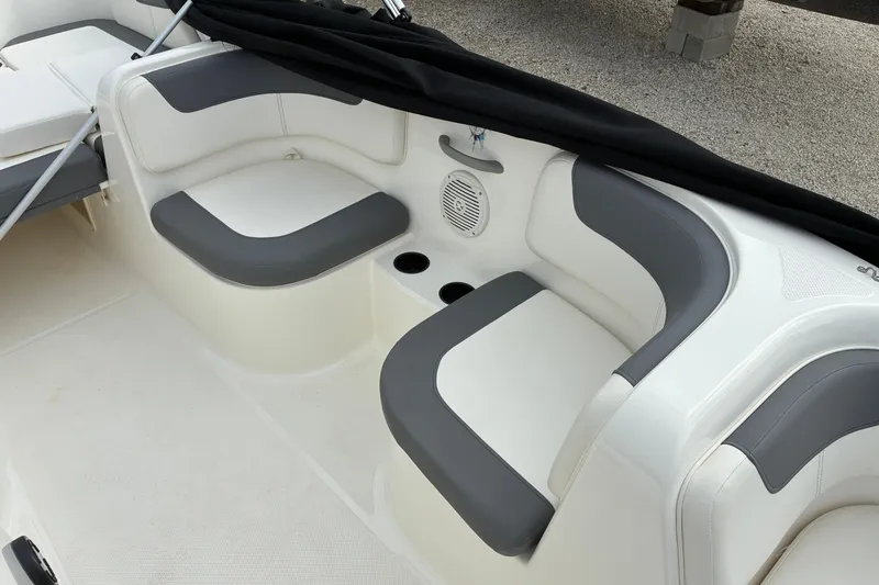 Slide: The Image of 2023 Bayliner Element 180 XL boat interior with gray and white seating. - 6