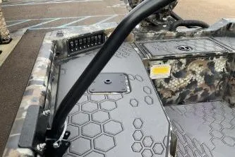 Slide: The Image of 2026 Excel 1751 Viper F4 boat interior with camouflage design and hexagonal pattern detailing. - 4