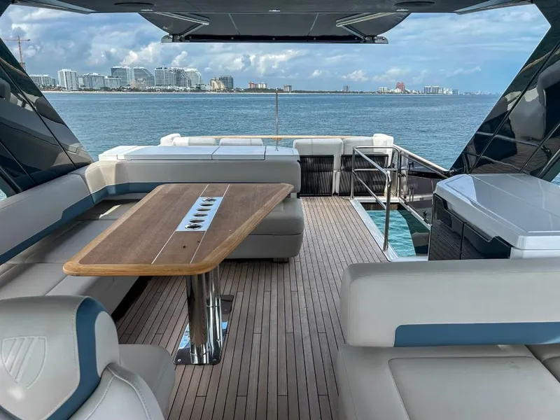 Slide: The Image of Luxury deck of 2024 Fairline Squadron 68 yacht with ocean view. - 42