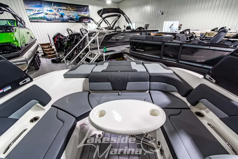 Slide: The Image of 2026 Chaparral 23 SSi boat interior at Lakeside Marina showroom. - 18
