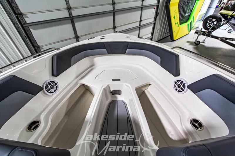 Slide: The Image of 2026 Chaparral 23 SSi boat interior with sleek seating and modern design. - 29
