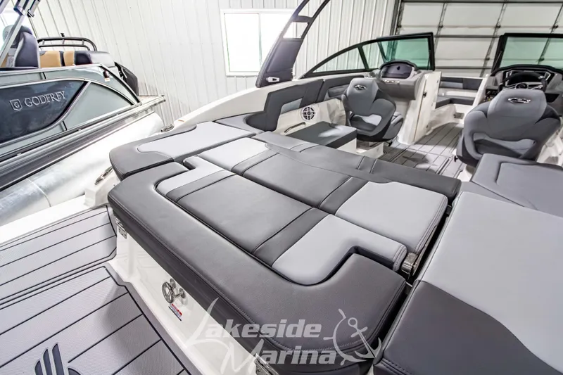 Slide: The Image of 2026 Chaparral 23 SSi boat interior with luxurious seating and modern design. - 9