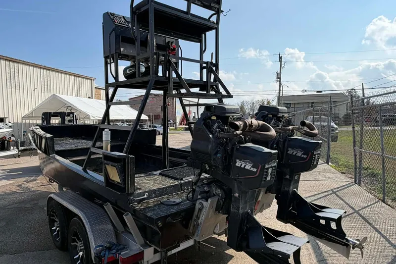 Slide: The Image of Custom 2015 2175 Bowfishing boat with dual engines and elevated platform. - 12