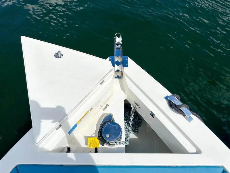 Slide: The Image of De Antonio Yachts D28 Open 2023 bow with anchor, in calm water. - 20