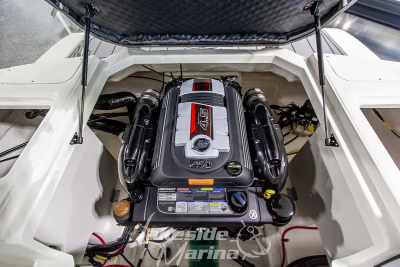 Slide: The Image of Engine compartment of 2026 Chaparral 23 SSi boat, featuring a powerful Mercury 4.5L engine. - 15