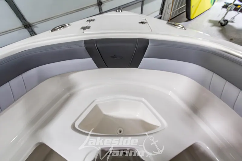 Slide: The Image of 2026 Chaparral 23 SSi boat interior with sleek seating at Lakeside Marina. - 28