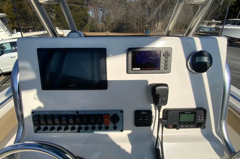 Slide: The Image of 2019 Key West 239 FS boat dashboard with Garmin and Yamaha electronics. - 13