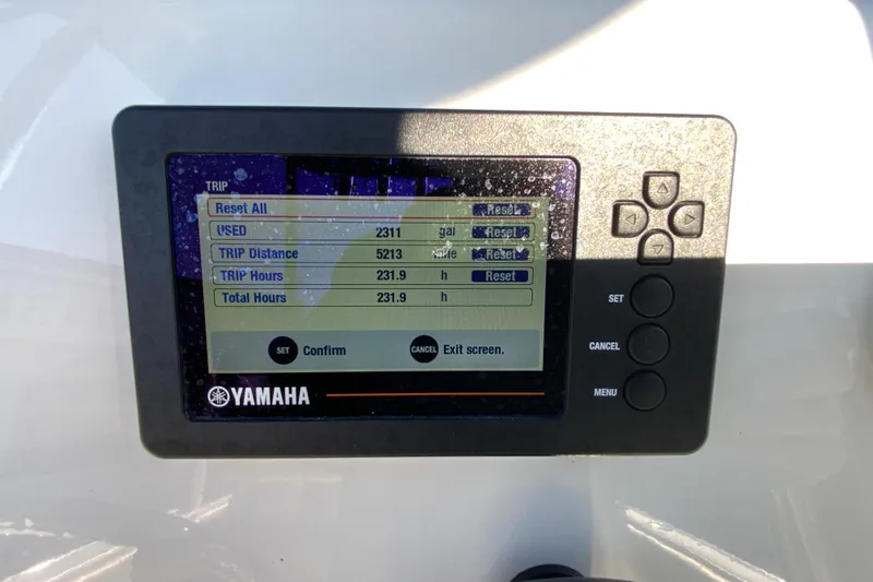 Slide: The Image of Yamaha display on 2019 Key West 239 FS showing trip data and settings. - 35