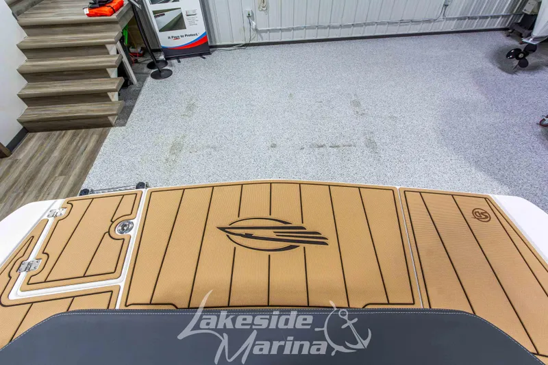 Slide: The Image of 2026 Chaparral 23 SSi boat deck at Lakeside Marina showroom. - 12