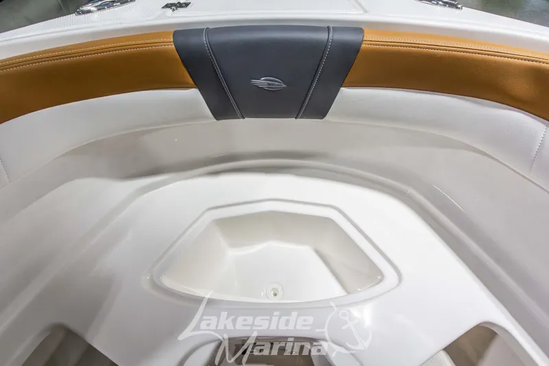Slide: The Image of Interior of 2026 Chaparral 23 SSi boat with tan and black seating. - 31