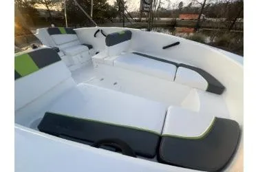 Slide: The Image of 2024 Tahoe T16 boat interior with cushioned seating and modern design. - 8