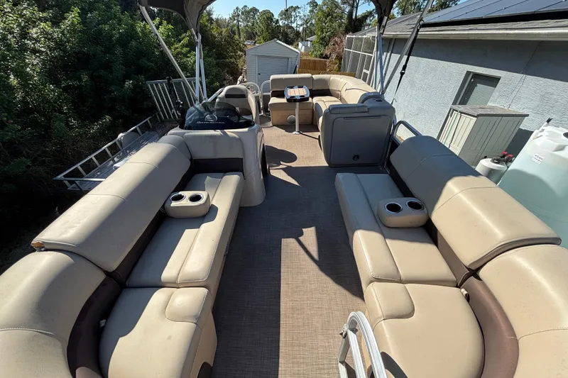 Slide: The Image of 2019 Sun Tracker Party Barge 20 DLX with spacious seating and cup holders. - 47