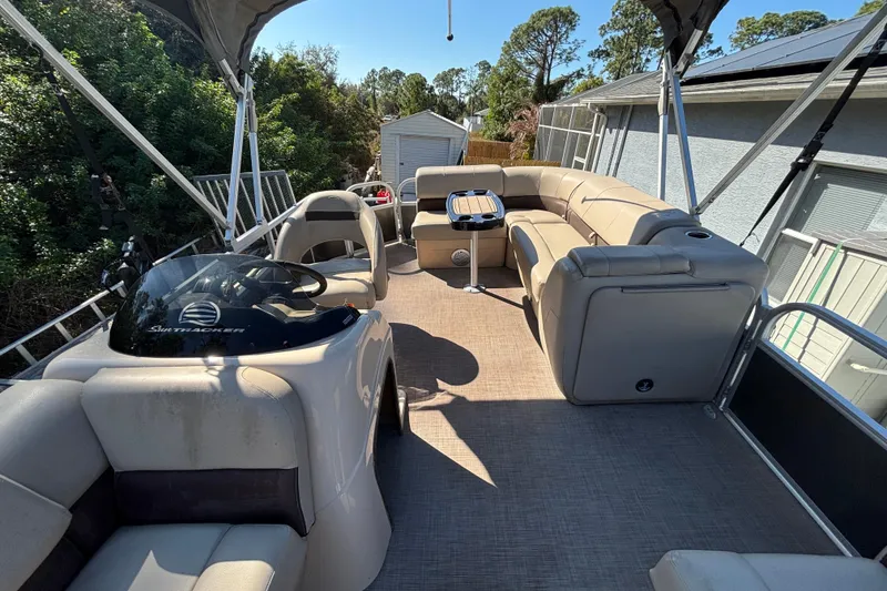 Slide: The Image of 2019 Sun Tracker Party Barge 20 DLX pontoon boat with spacious seating and helm. - 53