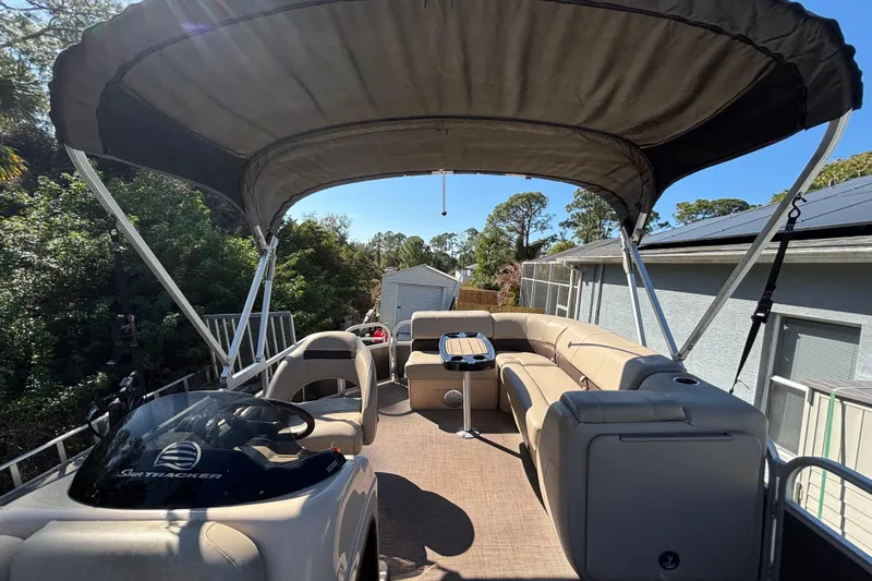 Slide: The Image of 2019 Sun Tracker Party Barge 20 DLX pontoon boat with canopy and seating. - 54