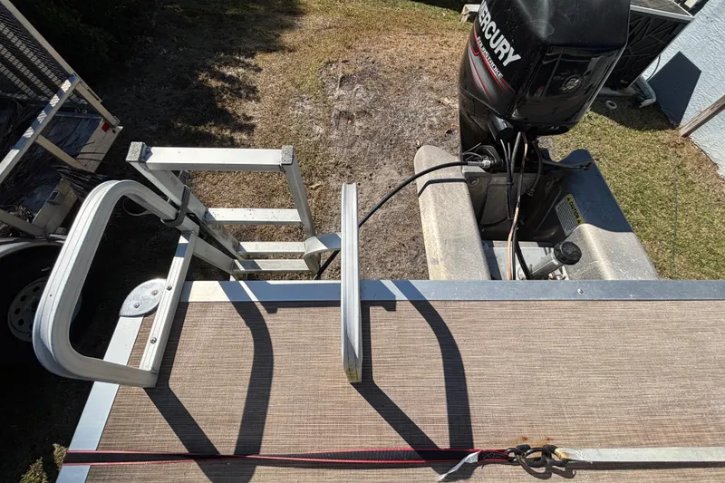 Slide: The Image of Battery compartment of a 2019 Sun Tracker Party Barge 20 DLX pontoon boat. - 74