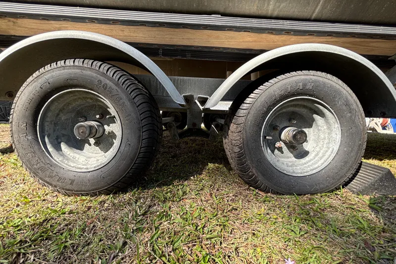 Slide: The Image of Label on a 2019 Sun Tracker Party Barge 20 DLX, featuring Mercury Marine engine details. - 77