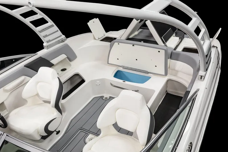 Slide: The Image of 2026 Chaparral 23 SSi boat interior at Lakeside Marina showroom, featuring luxurious seating. - 7