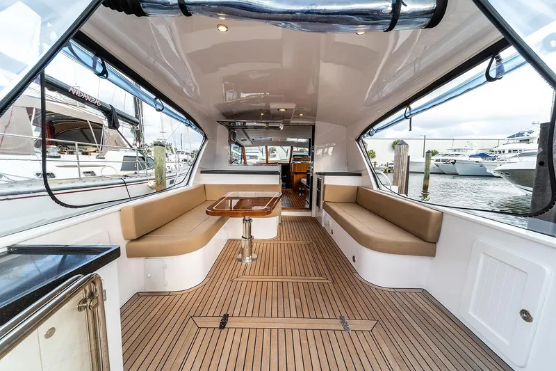 Slide: The Image of Manufacturer Provided Image: Luxurious 2025 Hylas M49 yacht interior with spacious seating and elegant wooden flooring. - 10
