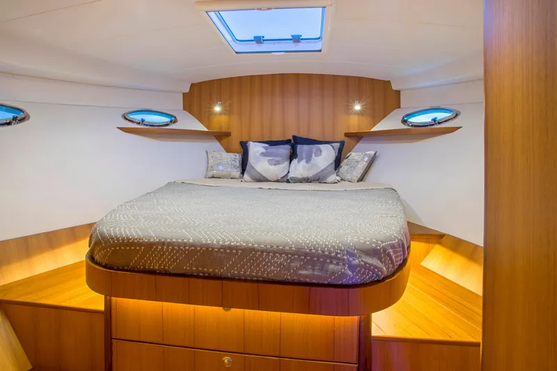 Slide: The Image of Luxurious cabin interior of 2025 Hylas M49 yacht with cozy bed and modern design. - 18