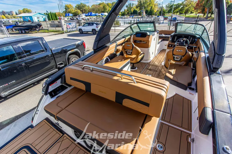 Slide: The Image of 2026 Chaparral SSX 6 boat interior with luxurious seating and modern dashboard. - 10