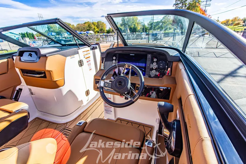 Slide: The Image of 2026 Chaparral SSX 6 boat interior with modern dashboard and steering wheel. - 20