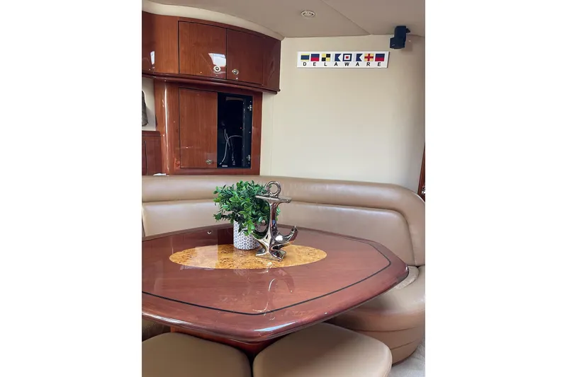 Slide: The Image of Luxurious interior of 2003 Sea Ray 550 Sundancer yacht with elegant wood finishes. - 22