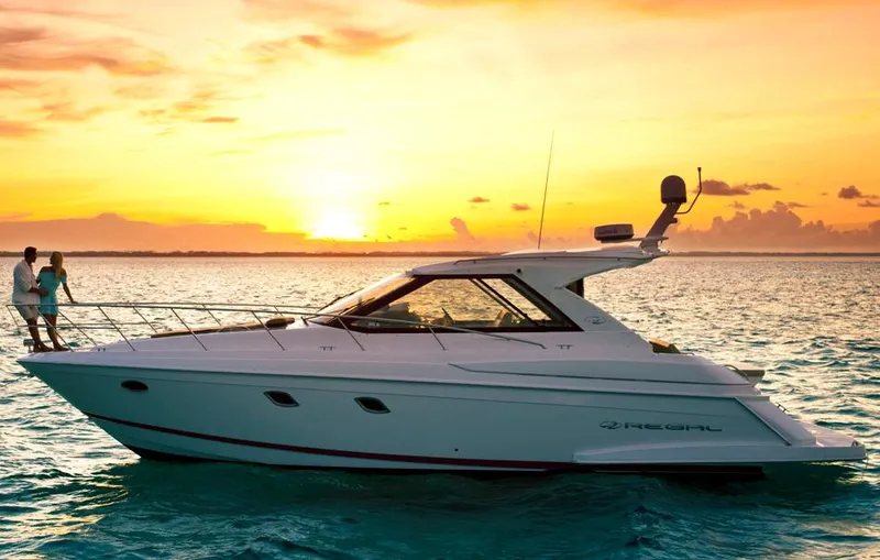 The Image of Manufacturer Provided Image: 2013 Regal 42 Sport Coupe yacht at sunset on the ocean. - 0