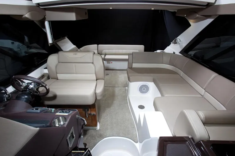 Slide: The Image of Manufacturer Provided Image: Interior of a 2013 Regal 42 Sport Coupe with beige leather seating. - 3
