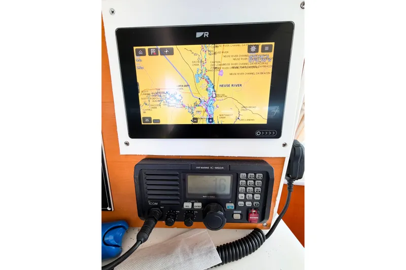 Slide: The Image of Navigation system and radio on a 2005 Lagoon 380 S2 catamaran. - 78