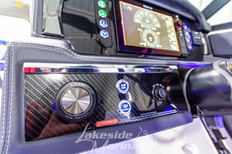 Slide: The Image of Dashboard of 2026 Chaparral SSX 6 boat with JL Audio controls and digital display. - 22