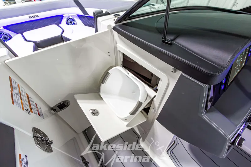 Slide: The Image of 2026 Chaparral SSX 6 boat interior with sleek design and modern amenities. - 28