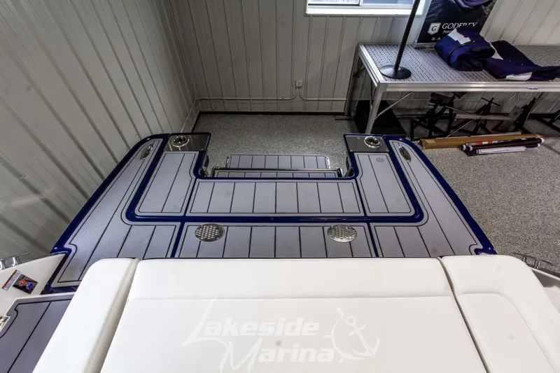 Slide: The Image of 2026 Chaparral SSX 6 boat deck with sleek design at Lakeside Marina. - 10