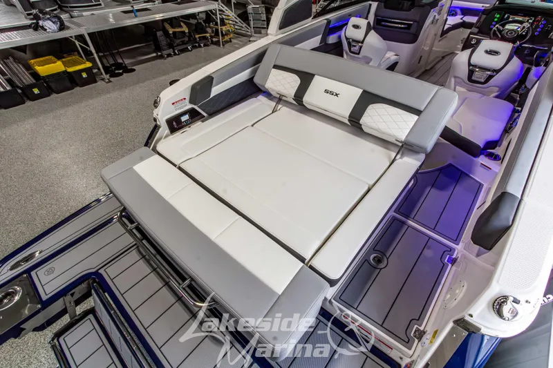 Slide: The Image of 2026 Chaparral SSX 6 boat interior with luxurious seating and modern dashboard. - 9