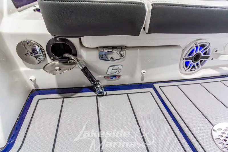 Slide: The Image of 2026 Chaparral SSX 6 boat interior with speaker and fuel cap detail. - 7
