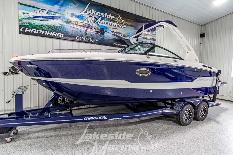The Image of 2026 Chaparral SSX 6 boat on trailer at Lakeside Marina showroom. - 2